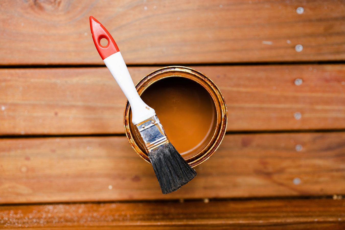 Deck staining and sealing
